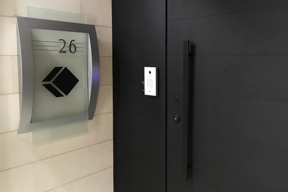 This Friday, Feb. 8 photo shows the entrance to Black Cube's offices on the 26th floor of central Tel Aviv high rise. The private investigation firm drew international criticism for its work protecting the reputation of disgraced Hollywood mogul Harvey Weinstein. (AP Photo/Raphael Satter)