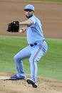 Texas Rangers starting pitcher Jordan Lyles throws in the first inning during a baseball game against the Chicago White Sox in Arlington, Texas, Sunday, Sept. 19, 2021. (AP Photo/Matt Strasen)