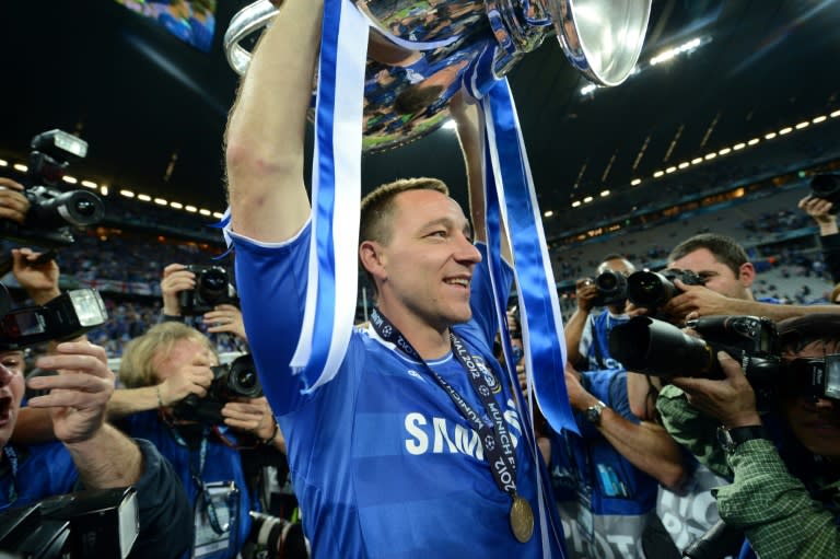 Chelsea's defender John Terry holds the trophy after the UEFA Champions League final in 2012