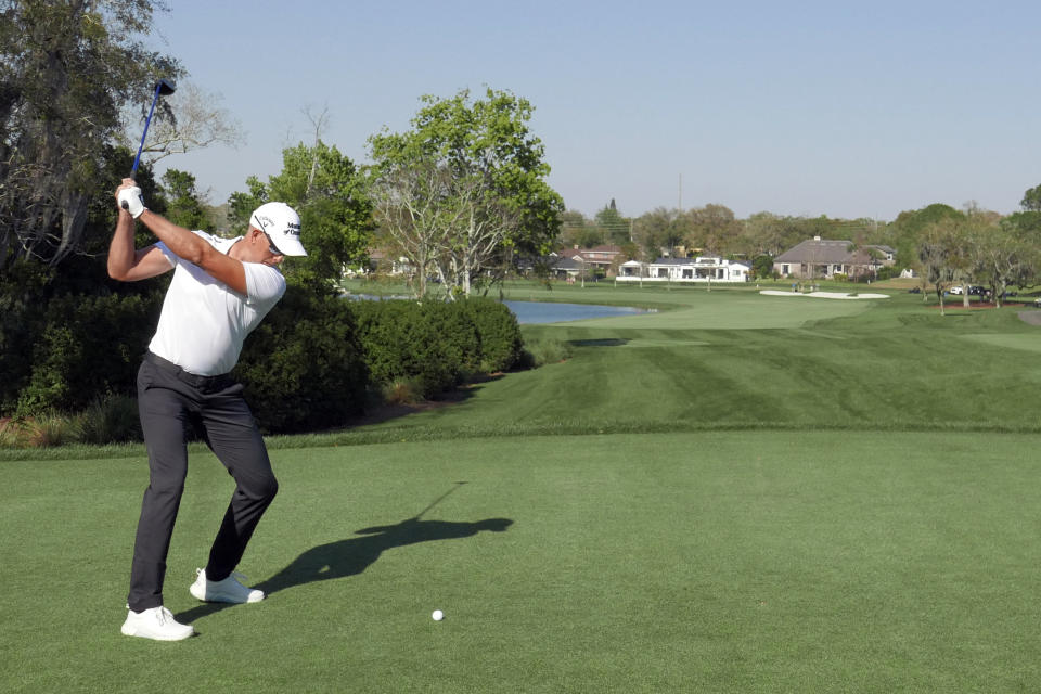 Henrik Stenson, of Sweden, hits a shot from the third tee during the second round of the Arnold Palmer Invitational golf tournament Friday, March 4, 2022, in Orlando, Fla. (AP Photo/John Raoux)