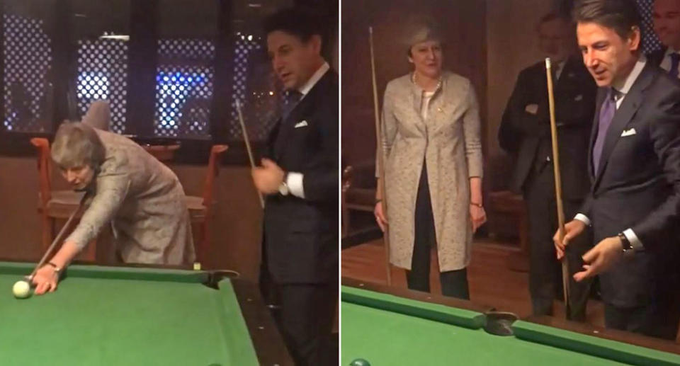 Theresa May had a game of pool with Italian prime minister Giuseppe Conte (Pictures: PA)