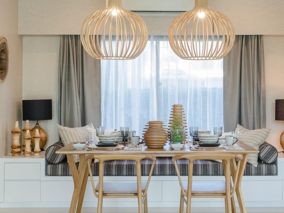 wooden table and chair in modern dinning room at home