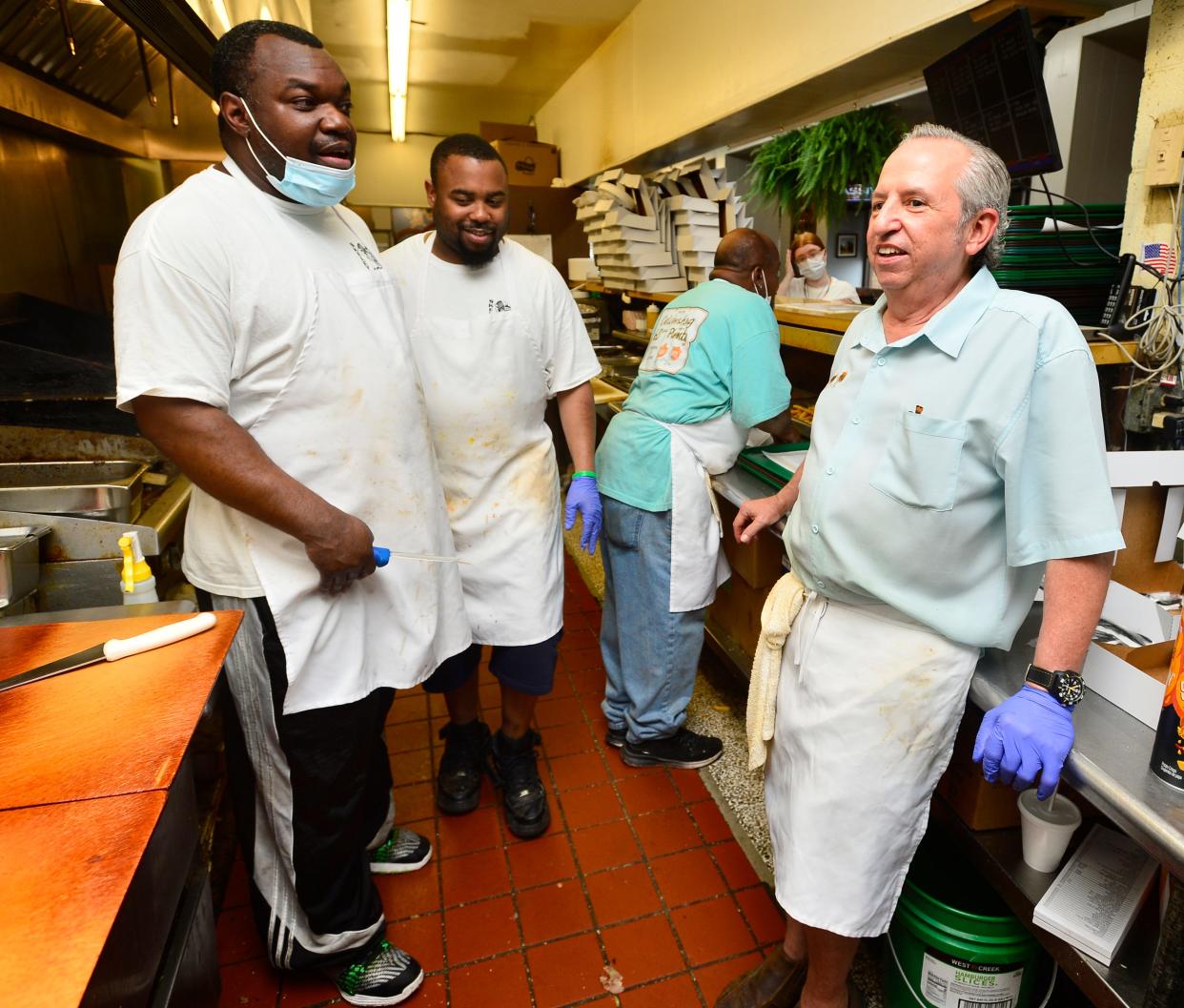 The Sugar-n-Spice restaurant in Spartanburg is now closing on Saturdays. Part of the reason is staffing difficulties, but the restaurant has a great staff. Some employees have worked there for more than 20 years. Lamont Salters, employee for 26 years, Larry Sullivan, employee for 25 years, Gary Roseburgh, employee for 24 years, and owner John 'JC' Copses on the line between orders on June 7, 2021.