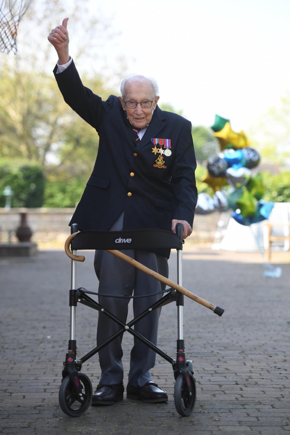 Captain Tom Moore walked 100 laps of his garden - and was watched by millions around the world (PA Wire)