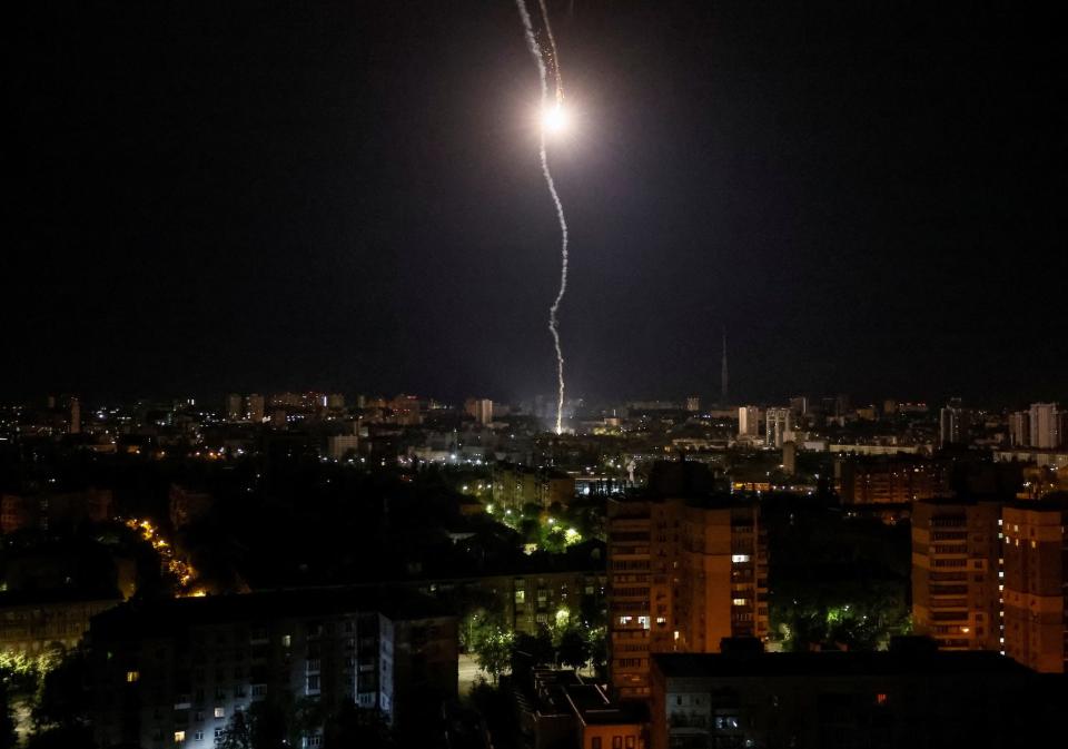 Explosion of a missile is seen in the night sky over the city during a Russian missile strike, amid Russia's attack on Ukraine, in Kyiv, Ukraine May 16, 2023