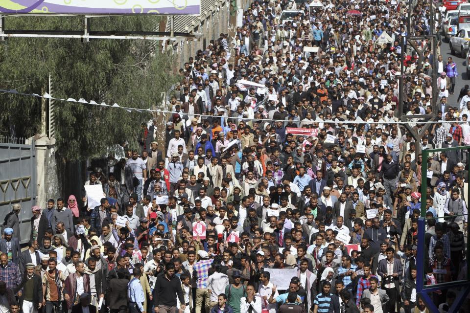 Anti-Houthi protesters take part during a rally in Sanaa