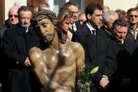 Members of the town's crafts guilds participate in a Good Friday procession on in Lohr am Main, Germany.