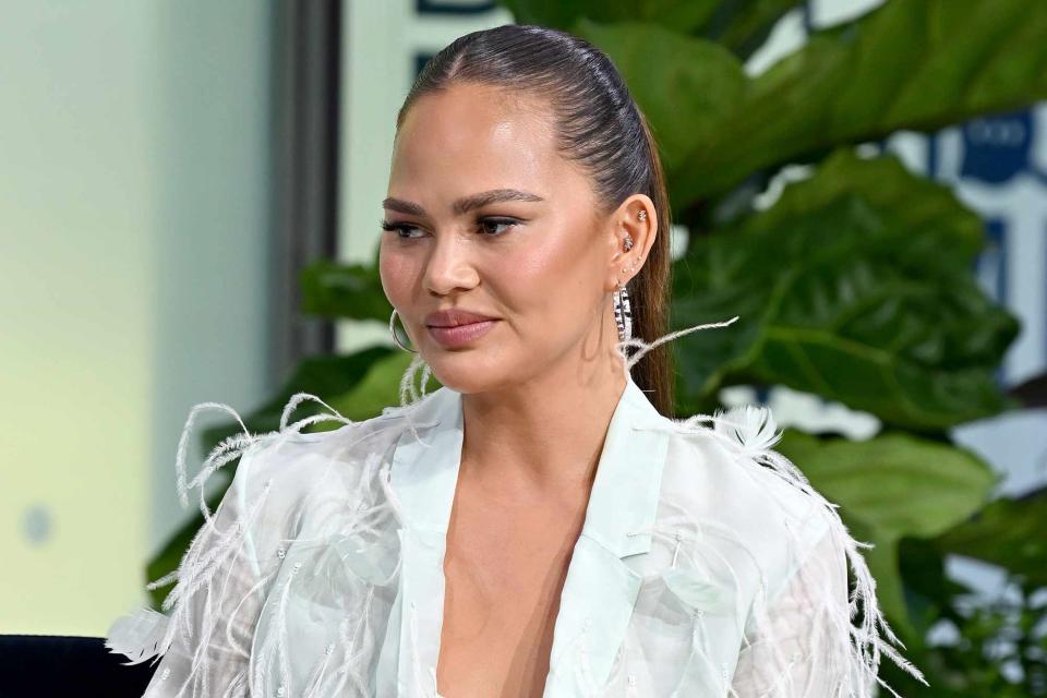 <p>Bryan Bedder/Getty Images for Aura/Digital Parenthood Summit</p> Chrissy Teigen speaks at the Aura