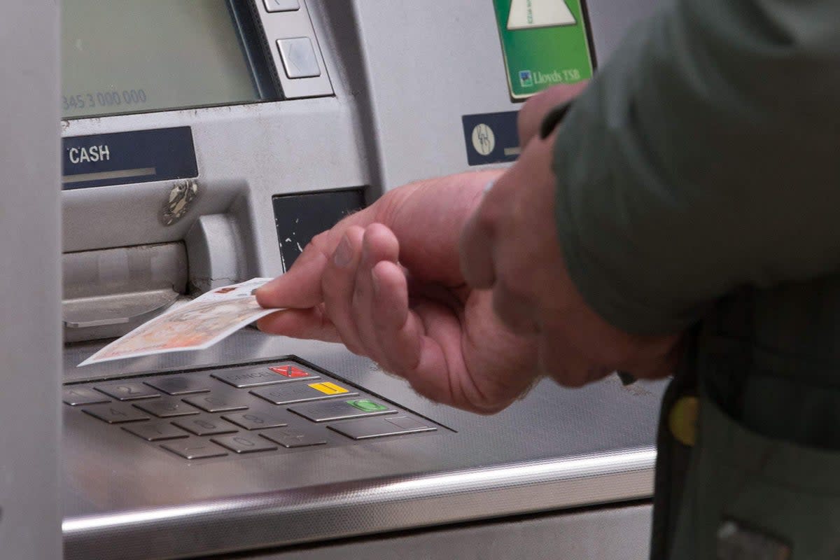 Cash machine use jumped this week as some cost-of-living payments started to hit bank accounts, according to ATM network Link (Aaron Chown/PA) (PA Wire)