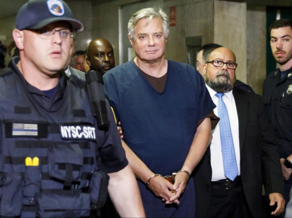 Paul Manafort is escorted from a New York courtroom in June 2019 (EPA-EFE/Justin Lane)