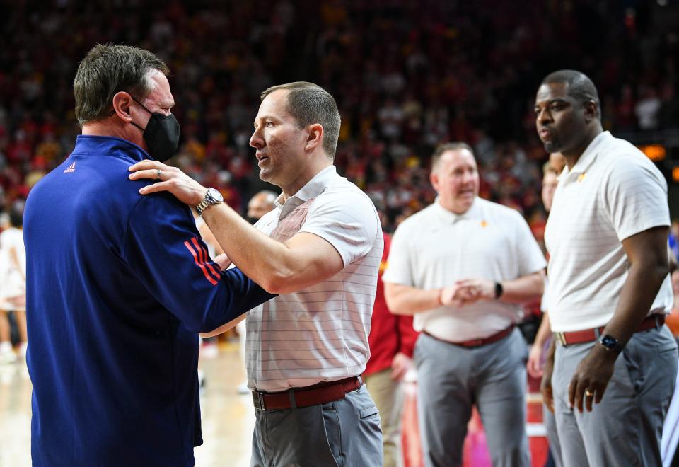 Kansas head coach Bill Self and Iowa State head coach T. J. Otzelberger chat before their game at the Hilton Coliseum Tuesday, Feb. 1, 2022, in Ames. 