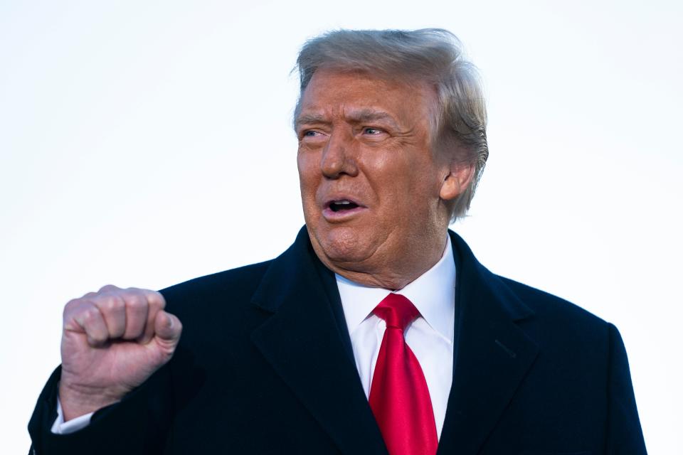 Outgoing US President Donald Trump addresses guests at Joint Base Andrews in Maryland on January 20, 2021. - President Trump and the First Lady travel to their Mar-a-Lago golf club residence in Palm Beach, Florida, and will not attend the inauguration for President-elect Joe Biden. (Photo by ALEX EDELMAN / AFP) (Photo by ALEX EDELMAN/AFP via Getty Images)