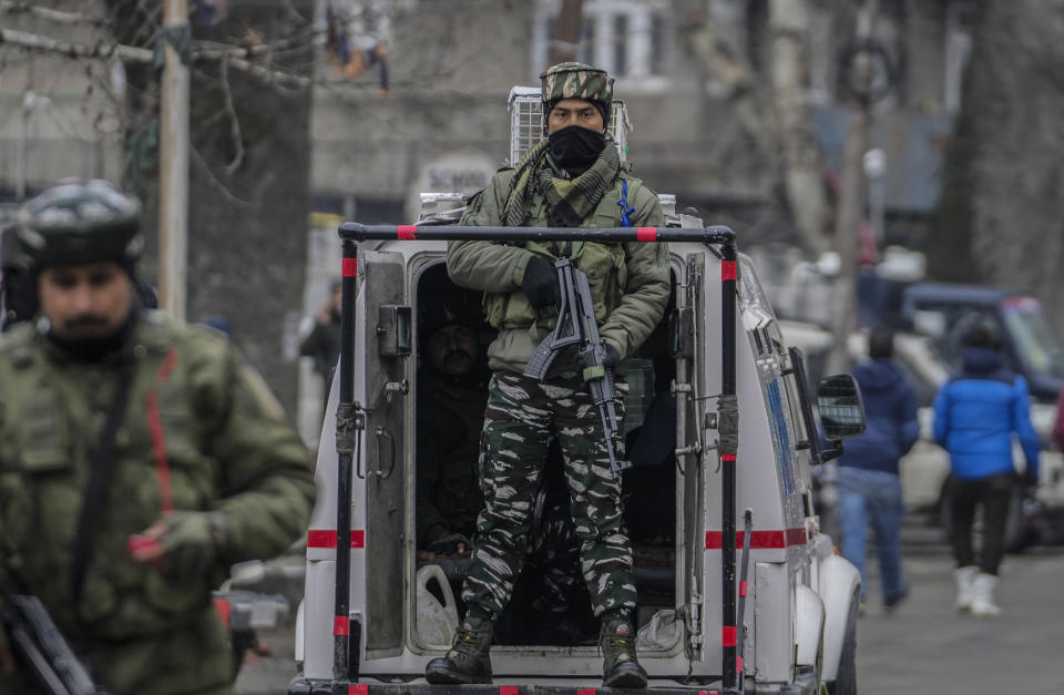 Indian security officers stand guard near the venue of a Republic Day parade in Srinagar, Indian controlled Kashmir, Thursday, Jan. 26 , 2023. The day marks the anniversary of the adoption of the country’s constitution on Jan. 26, 1950, nearly three years after it won independence from British colonial rule. (AP Photo/Mukhtar Khan)