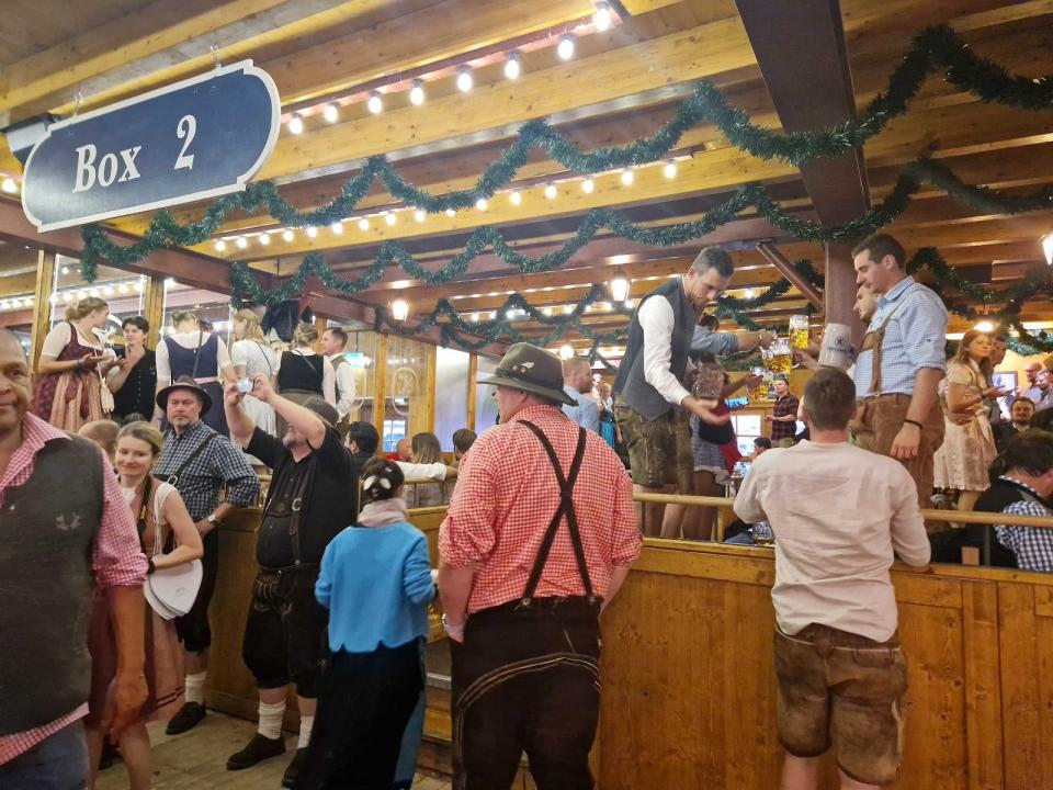 people in outer tents at oktoberfest