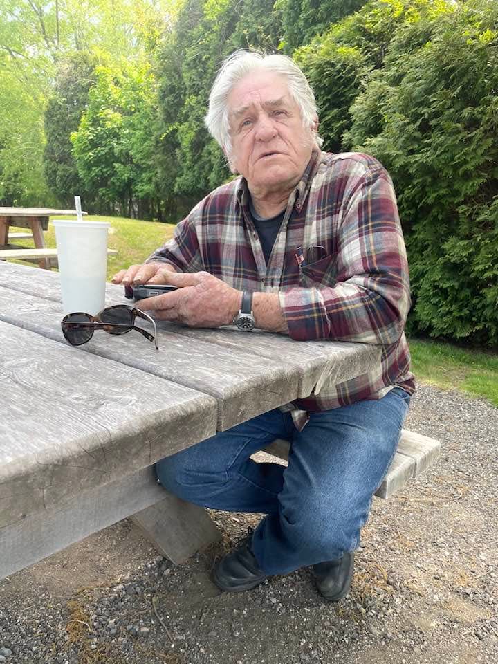 Preston resident Bill Koozmitch enjoying a Banana Shake at Millie's Ice Cream in Norwich Friday. He said the ice cream stand treats customers right, saying "I come here quite often and I've never had bad ice cream."