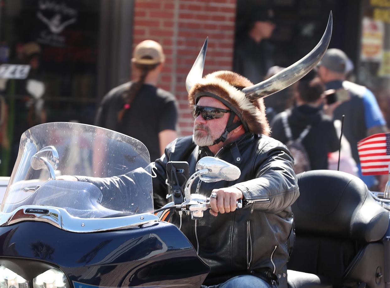 A biker wears a horned helmet during Bike Week in Daytona Beach on Monday, March 8, 2021. (Stephen M. Dowell/Orlando Sentinel)