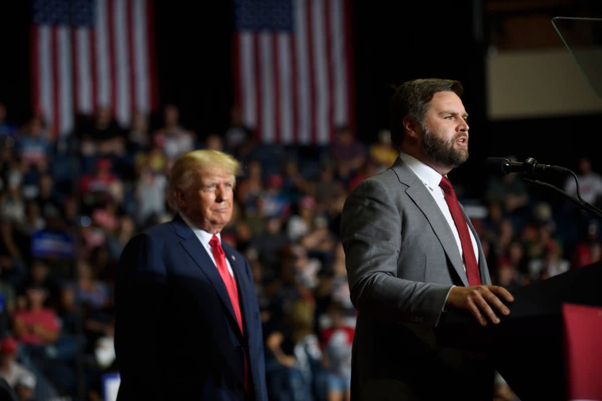 Donald Trump watches approvingly as his endorsed Senate hopeful JD Vance speaks in Youngstown, Ohio. (Getty Images)