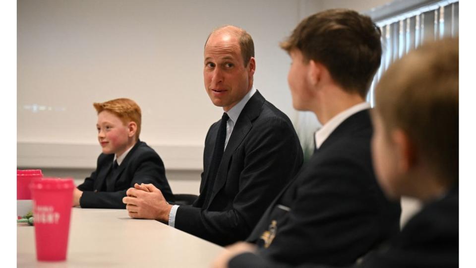 Prince William talking to pupils in Birmingham school