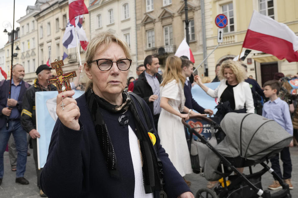 Anti-abortion demonstrators march in support of every conceived life and against steps taken by the new government to liberalize Poland's strict law and allow termination of pregnancy until the 12th week, in Warsaw, Poland, on Sunday, April 14, 2024. Last week, Poland's parliament, which is dominated by the liberal and pro-European Union ruling coalition, voted to approve further detailed work on four proposals to lift the near-ban on abortions. (AP Photo/Czarek Sokolowski)