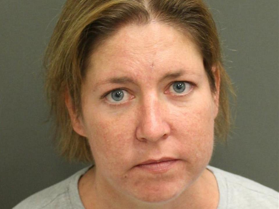 Sarah Boone, 46, of Winter Park, Florida, has been charged with second-degree murder after allegedly zipping her boyfriend Jorge Torres in a suitcase and leaving him to die (Orange County Jail)