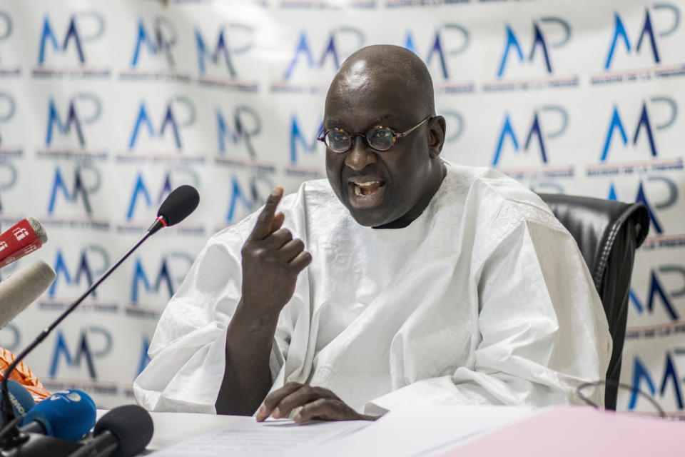 Papa Massata Diack, son of Lamine Diack the former president of the International Association of Athletics Federations (IAAF) now known as World Athletics, speaks at a press conference in Dakar, Senegal Monday, Sept. 14, 2020. The son of the former head of world track and field's governing body again denounced the corruption and money laundering charges against himself and his father Monday, with a verdict in the trial in France expected to be delivered on Wednesday. (AP Photo/Sylvain Cherkaoui)