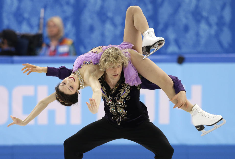 Meryl Davis and Charlie White of the United States compete in the ice dance free dance figure skating finals at the Iceberg Skating Palace during the 2014 Winter Olympics, Monday, Feb. 17, 2014, in Sochi, Russia. (AP Photo/Darron Cummings)