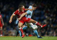 Soccer Football - Carabao Cup Semi Final First Leg - Manchester City vs Bristol City - Etihad Stadium, Manchester, Britain - January 9, 2018 Manchester City's John Stones in action with Bristol City's Bobby Reid Action Images via Reuters/Carl Recine