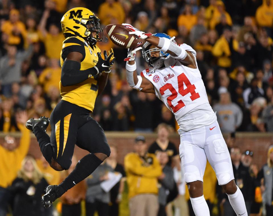 COLUMBIA, MISSOURI - OCTOBER 12: Defensive back Deantre Prince #24 of the Mississippi Rebels breaks up a pass attended for wide receiver Jalen Knox #9 of the Missouri Tigers in the second quarter at Faurot Field/Memorial Stadium on October 12, 2019 in Columbia, Missouri. (Photo by Ed Zurga/Getty Images)