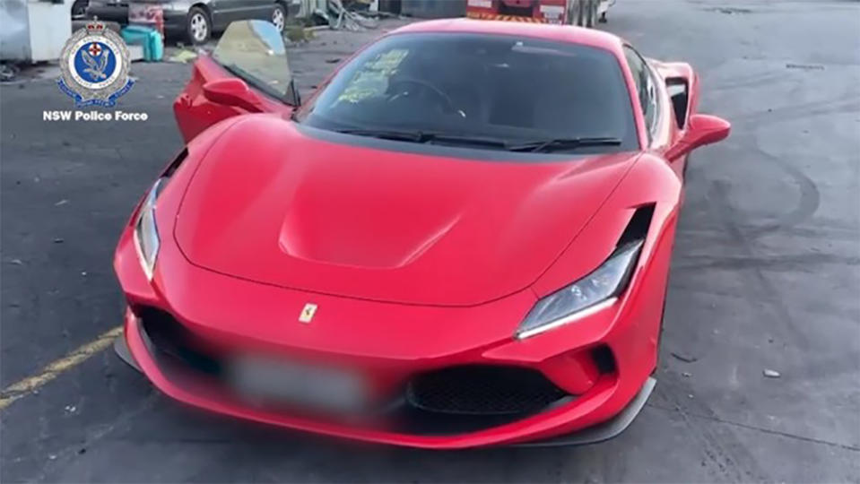 A red Ferrari seized from a Marrickville, Australia car dealership