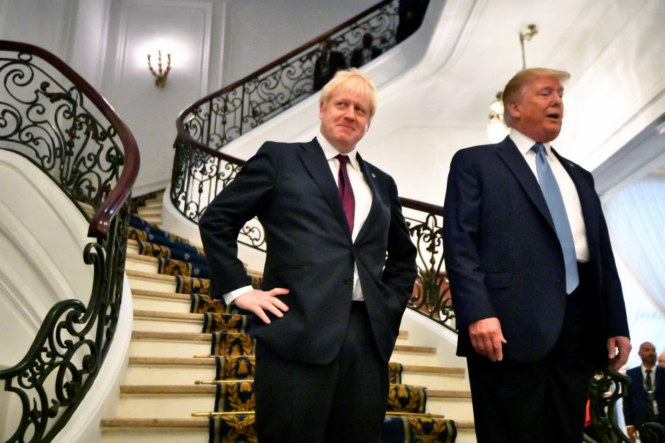BIARRITZ, FRANCE - AUGUST 25: U.S. President Donald Trump and Britain's Prime Minister Boris Johnson arrive for a bilateral meeting during the G7 summit on August 25, 2019 in Biarritz, France. The French southwestern seaside resort of Biarritz is hosting the 45th G7 summit from August 24 to 26. High on the agenda will be the climate emergency, the US-China trade war, Britain's departure from the EU, and emergency talks on the Amazon wildfire crisis. (Photo by Dylan Martinez - Pool/Getty Images)