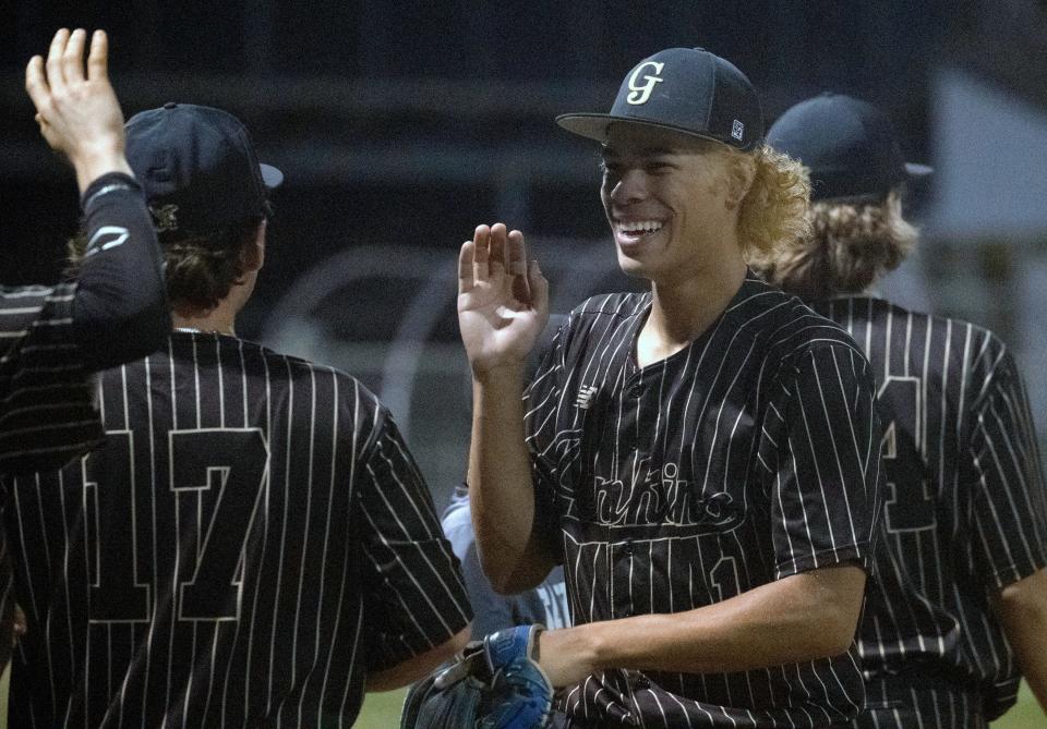 George Jenkins pitcher Xavier Glover is congratulated by his teammates after striking out the final batter of the fourth inning against Ocala Forest.