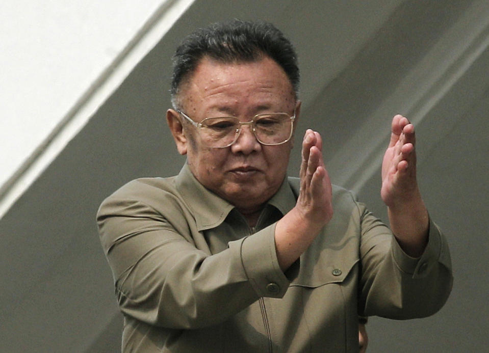 FILE - In this Oct. 10, 2010 photo, then North Korean leader Kim Jong Il applauds following a massive military parade marking the 65th anniversary of the communist nation's ruling Workers' Party in Pyongyang, North Korea. North Korean leader Kim Jong Un’s two-week absence from public view has inspired speculation and rumors, but past disappearances of North Korea's ruling elite frequently have simply shown the disconnect between insatiable curiosity about the country and the secrecy surrounding its leadership. (AP Photo/Vincent Yu, File)