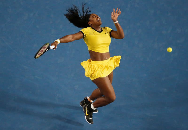 FILE PHOTO: Williams of the U.S. reacts after being hit by a ball during her final match against Germany's Kerber at the Australian Open tennis tournament at Melbourne Park