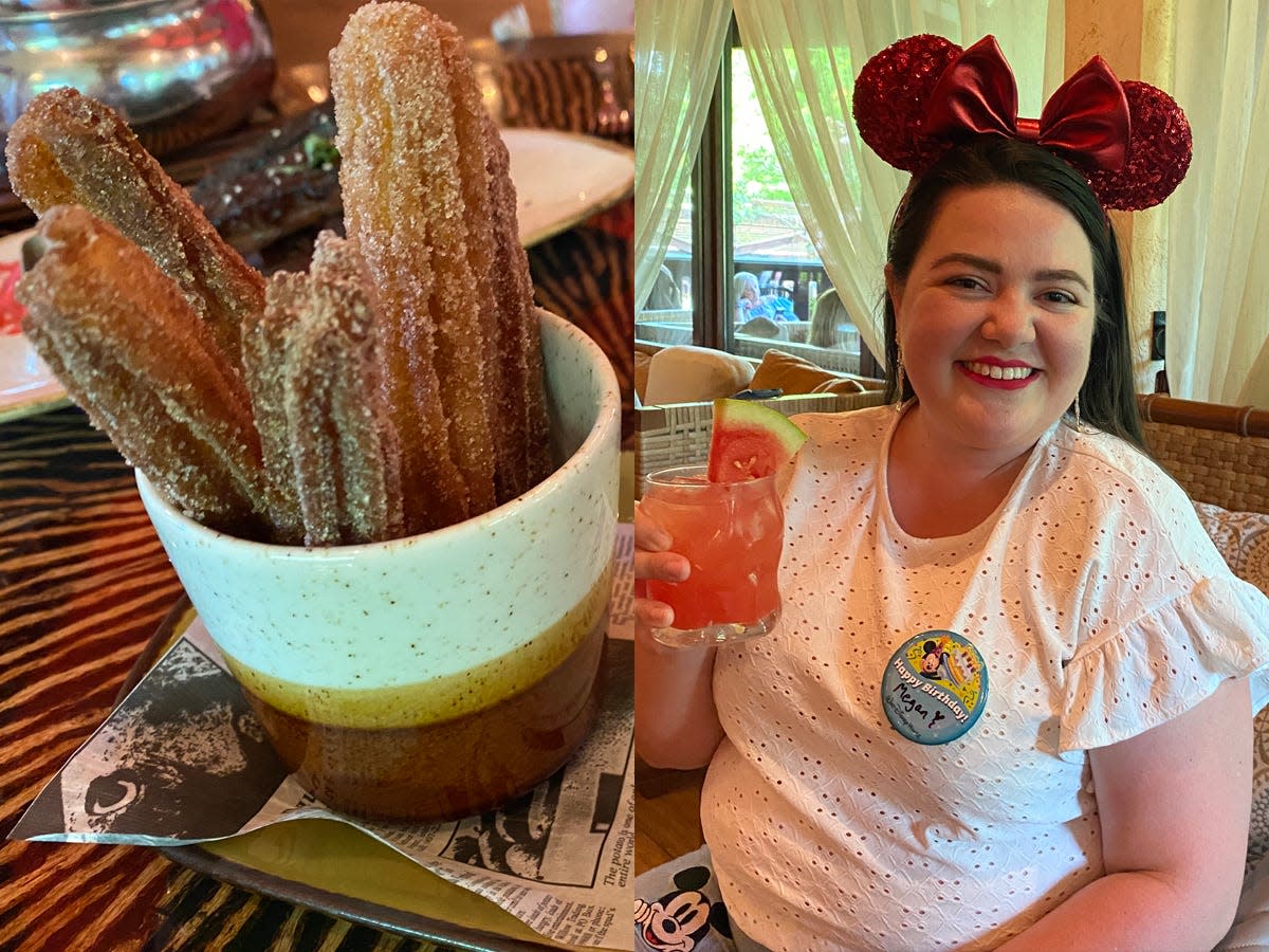 Churros served on a tray; The writer holds a cocktail and wears red mouse ears