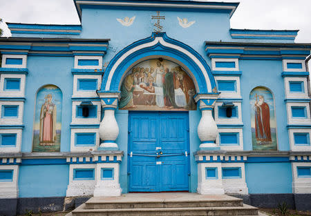 A church is seen as it is padlocked in the village of Ptycha, Ukraine May 13, 2018. Picture taken May 13, 2018. REUTERS/Gleb Garanich