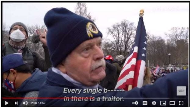 Thomas Caldwell being interviewed outside the U.S. Capitol on January 6, 2021.