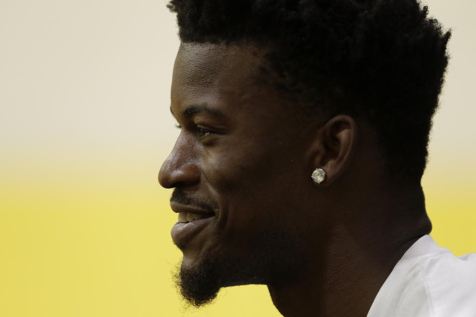 Miami Heat guard Jimmy Butler speaks during an NBA basketball news conference, Friday, Sept. 27, 2019, in Miami. Butler spoke publicly for the first time since the July trade that brought him to South Florida as the new face of the franchise. (AP Photo/Lynne Sladky)