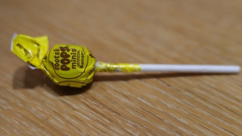 Banana Tootsie Pop on counter