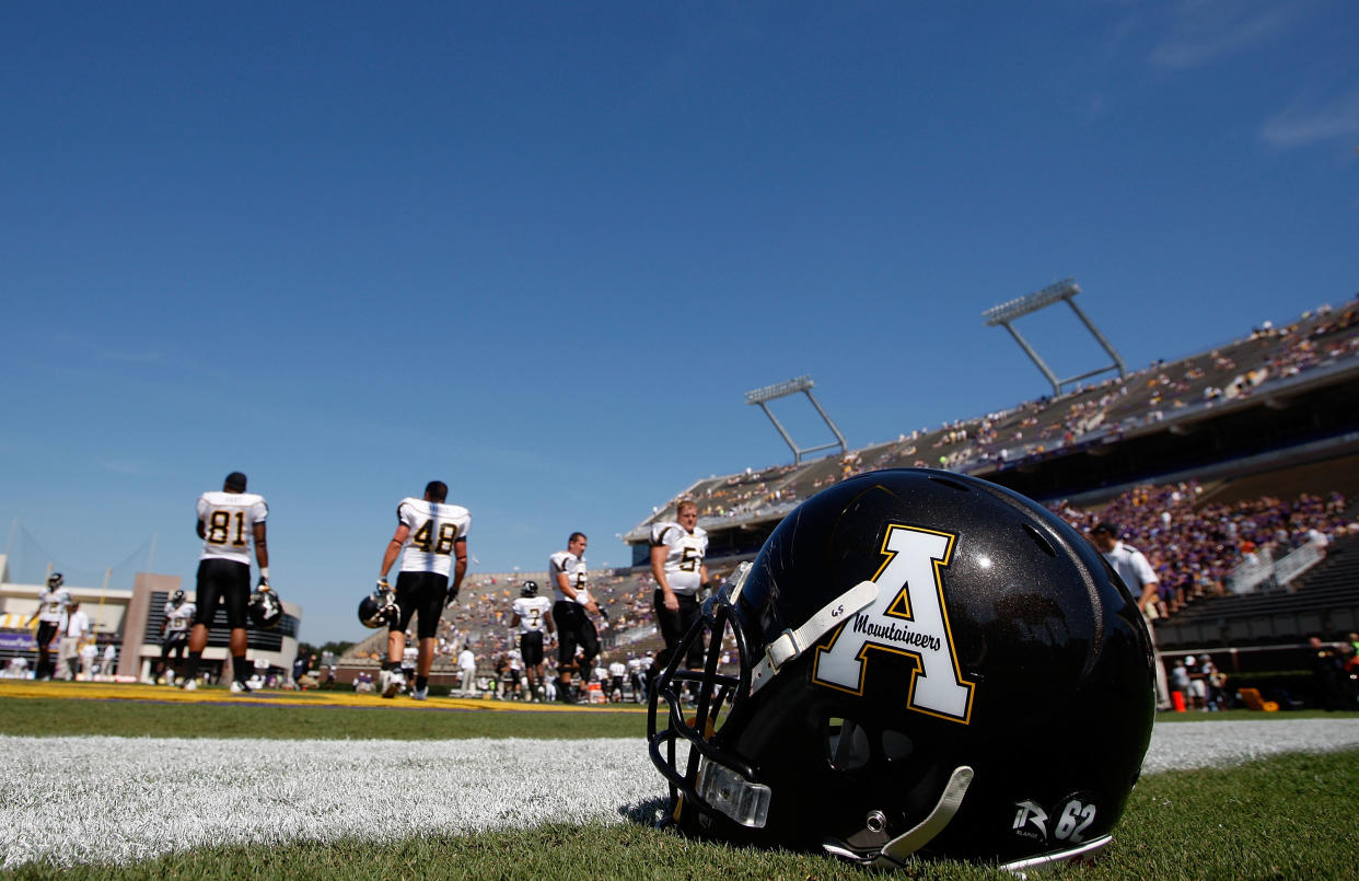 GREENVILLE, NC - SEPTEMBER 05:  A football helmet sits on the sideline during warm-ups before the start of the Appalachian State Mountaineers versus East Carolina Pirates at Dowdy-Ficklen Stadium on September 5, 2009 in Greenville, North Carolina.  (Photo by Streeter Lecka/Getty Images)