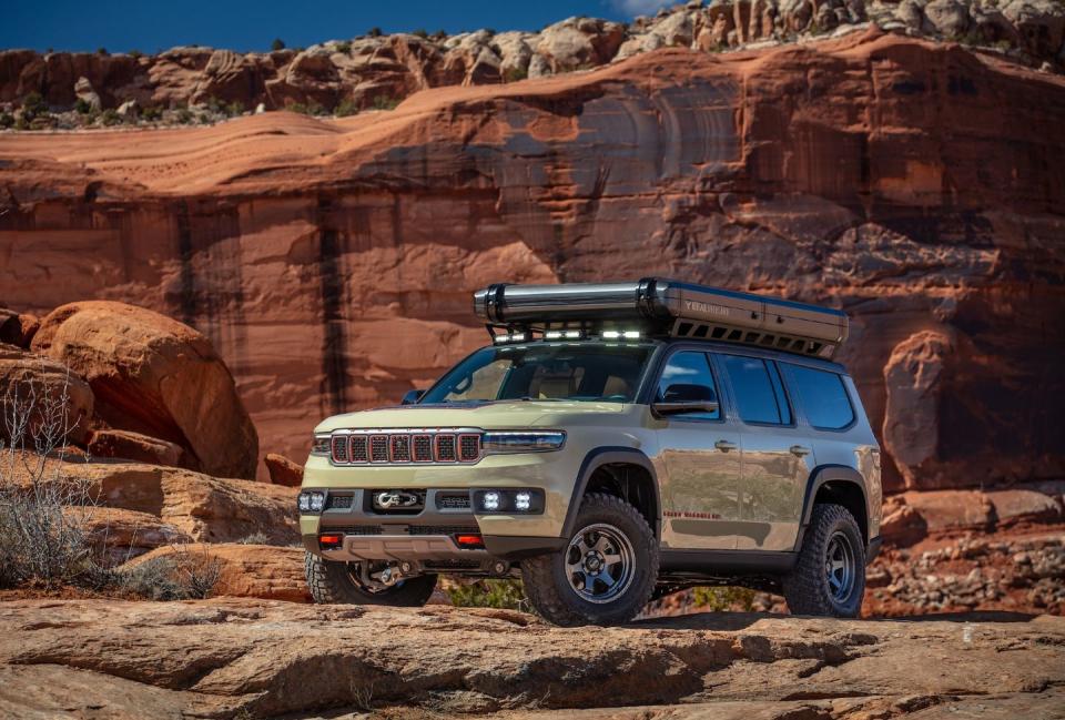 <p>This Grand Wagoneer isn't like others roaming mall parking lots. That's because Jeep designed this concept for overlanding, which should be evident by its chunky 35-inch tires and extensive auxiliary exterior lights—oh, and it's massive rooftop tent. Power comes from the new high-output Hurricane engine, a 510-hp twin-turbo 3.0-liter inline-six.</p>