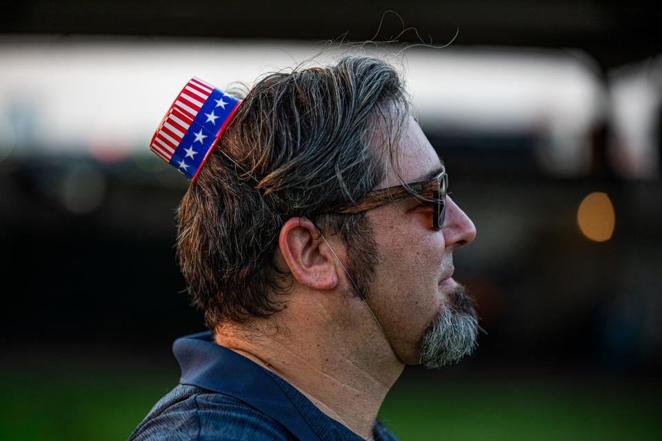 Josh Woods showed his patriotism with a tiny hat at Waterfront Park before the Louisville Orchestra's Independence Day concert and fireworks show. July 4, 2021