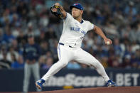 Toronto Blue Jays pitcher Yusei Kikuchi works against the Seattle Mariners during first inning of a baseball game in Toronto, Wednesday, April 10, 2024. (Nathan Denette/The Canadian Press via AP)