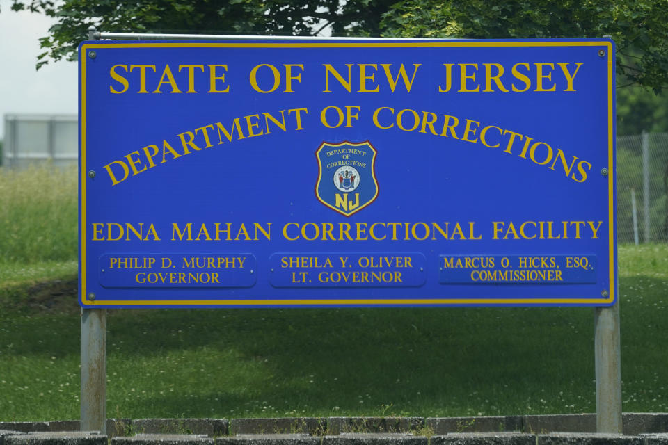 A sign is displayed at the entrance to the Edna Mahan Correctional Facility for Women in Clinton, N.J., Tuesday, June 8, 2021. New Jersey's embattled corrections commissioner announced his resignation Tuesday, a day after Gov. Phil Murphy said the state would shutter its long-troubled and only women's prison. (AP Photo/Seth Wenig)