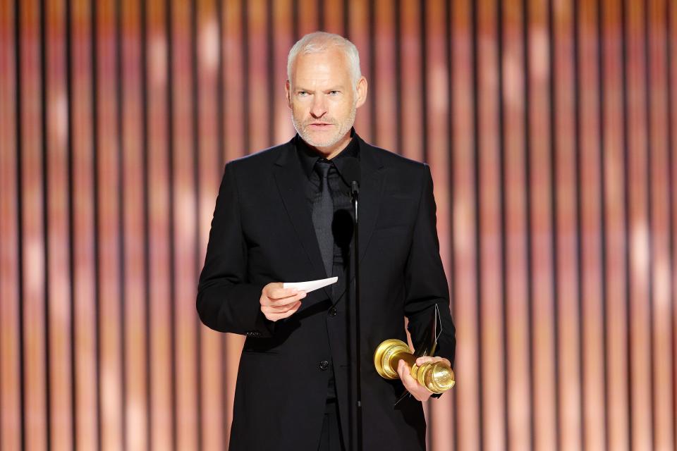 Martin McDonagh accepts the best screenplay award for "The Banshees of Inisherin," which also won for best comedy/musical at the Golden Globes.