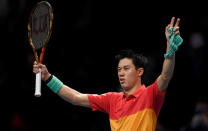 Tennis - ATP Finals - The O2, London, Britain - November 11, 2018 Japan's Kei Nishikori celebrates winning his group stage match against Switzerland's Roger Federer Action Images via Reuters/Tony O'Brien