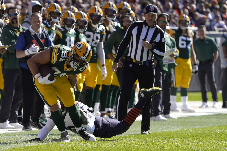 Green Bay Packers tight end Josiah Deguara keeps his feet inbounds on a reception from quarterback Aaron Rodgers during the second half of an NFL football game against the Chicago Bears Sunday, Oct. 17, 2021, in Chicago. (AP Photo/David Banks)