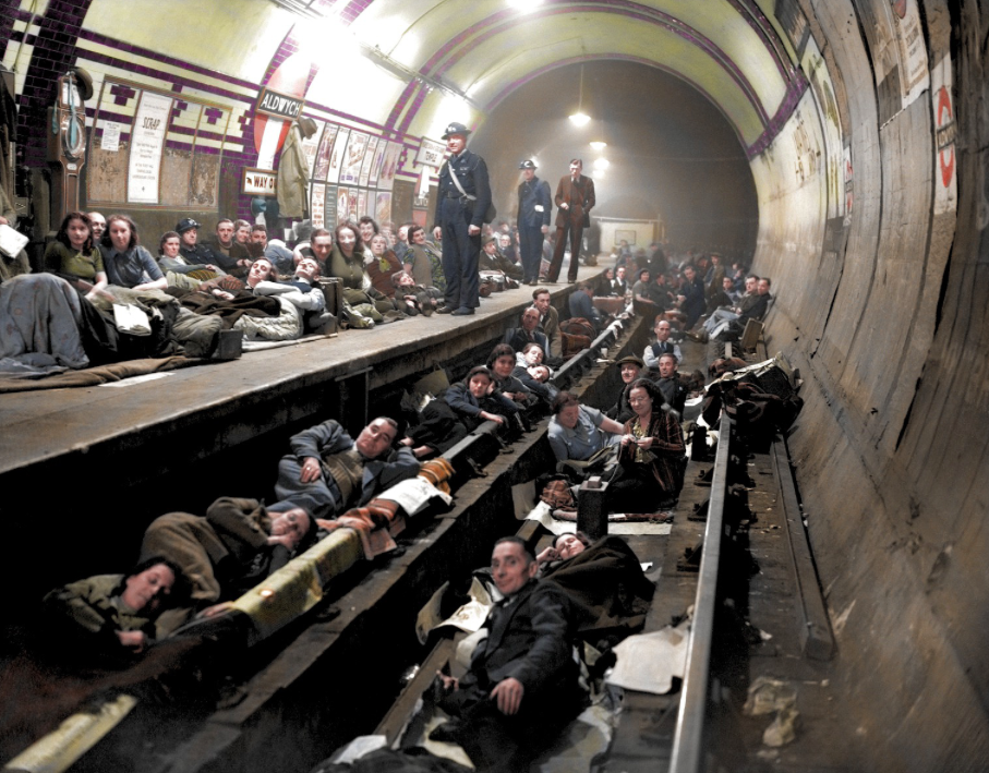 <p>Londoners lie on the tracks at Aldwych Underground Station to shelter from the aerial bombardment. (MediaDrumWorld) </p>