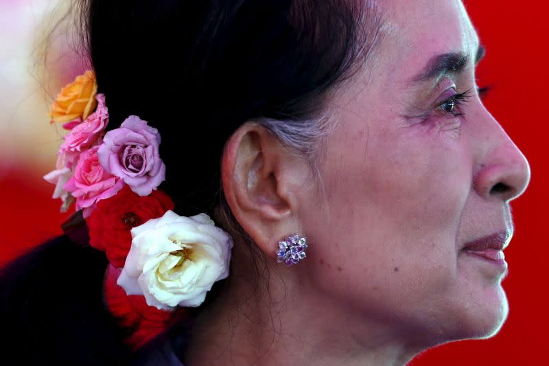 FILE PHOTO: Myanmar's National League for Democracy Party leader Aung San Suu Kyi looks on during a news conference at her home in Yangon