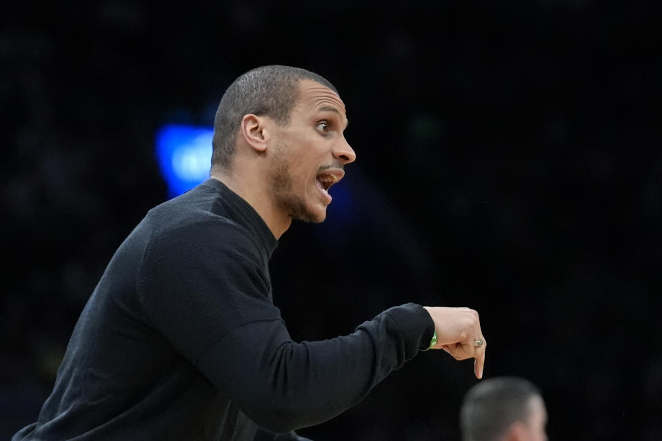 Boston Celtics head coach Joe Mazzulla shouts from the bench in the first half of an NBA basketball game against the Golden State Warriors, Sunday, March. 3, 2024, in Boston. (AP Photo/Steven Senne)