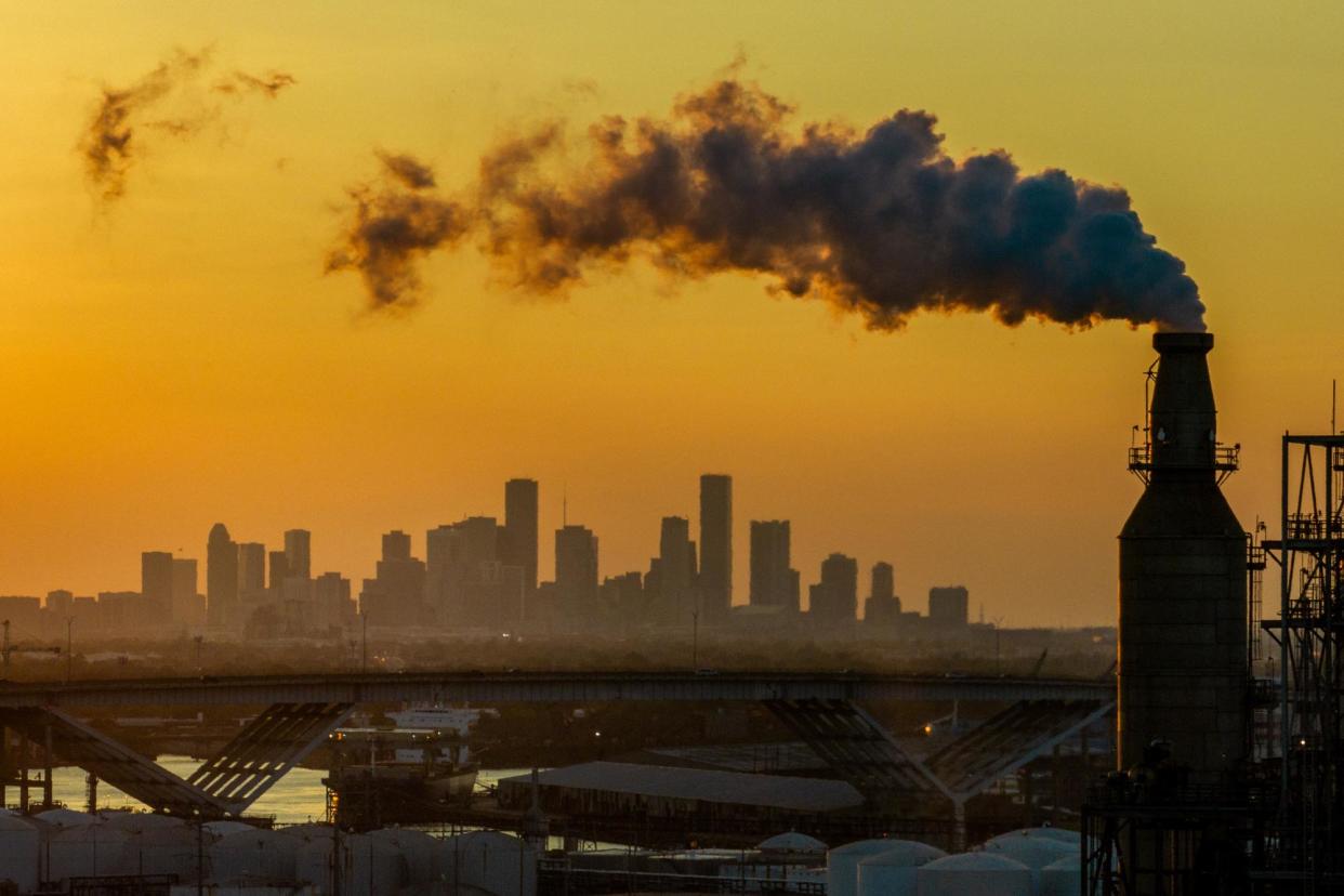 <span>Emissions from an oil refinery in Houston, Texas.</span><span>Photograph: Brandon Bell/Getty Images</span>
